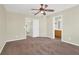 Spacious bedroom with neutral walls, carpet and an attached bathroom at 5783 Sol Vista Ave, Las Vegas, NV 89122
