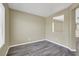 The office has gray wood floors and large windows at 5783 Sol Vista Ave, Las Vegas, NV 89122