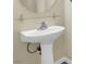 Pedestal sink in the downstairs powder room at 5783 Sol Vista Ave, Las Vegas, NV 89122