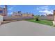 Large backyard patio with block wall and some landscaping at 5845 Killala Ct, Las Vegas, NV 89110