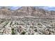 Aerial view of the surrounding community nestled against the backdrop of mountains at 5845 Killala Ct, Las Vegas, NV 89110