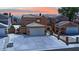Charming two-story home with a tile roof, solar panels, and a spacious driveway with manicured landscaping at 5845 Killala Ct, Las Vegas, NV 89110