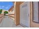 Close up view of the front door and security door at 5845 Killala Ct, Las Vegas, NV 89110