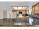 Modern kitchen with wood cabinets, a stylish backsplash, and sleek countertops for a functional cooking space at 5845 Killala Ct, Las Vegas, NV 89110