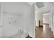 Functional laundry room with built-in shelving, with easy access to the rest of the home at 5845 Killala Ct, Las Vegas, NV 89110