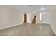Open-concept living room with tile flooring and a staircase leading to the upper level at 5845 Killala Ct, Las Vegas, NV 89110