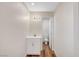 Bathroom featuring new vanity, neutral walls and a view to the toilet at 609 Greenbriar Townhouse Way, Las Vegas, NV 89121
