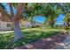 View of a well-maintained lawn and landscaping highlighting the community's outdoor appeal at 609 Greenbriar Townhouse Way, Las Vegas, NV 89121