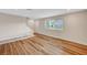 Inviting living space featuring modern flooring, neutral walls, and natural light at 609 Greenbriar Townhouse Way, Las Vegas, NV 89121