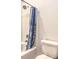 Bright bathroom featuring a shower with blue patterned curtain at 6437 Wide Sky St, Las Vegas, NV 89166