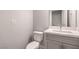 Well-lit bathroom with a single sink vanity and modern fixtures at 6437 Wide Sky St, Las Vegas, NV 89166