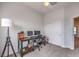 Bedroom setup as office featuring carpet and a door to another room at 6437 Wide Sky St, Las Vegas, NV 89166