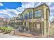 Charming townhome with stone accents, wrought iron railings, and well-maintained landscaping at 6437 Wide Sky St, Las Vegas, NV 89166