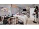 Bedroom featuring a TV on the wall and various wall decorations at 7109 Red Gulch St, North Las Vegas, NV 89084
