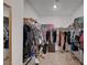Spacious walk-in closet with ample shelving and rod space for organization at 7109 Red Gulch St, North Las Vegas, NV 89084
