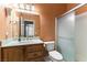 Cozy bathroom featuring a vanity sink and shower with sliding glass doors at 7549 Evening Falls Dr Dr, Las Vegas, NV 89131