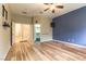 Spacious bedroom featuring a ceiling fan, hardwood flooring, and a walk-in closet at 7549 Evening Falls Dr Dr, Las Vegas, NV 89131
