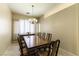 Formal dining room featuring a large table and stylish chandelier at 7549 Evening Falls Dr Dr, Las Vegas, NV 89131