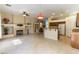 Open living room with fireplace, tile flooring, and open layout at 7549 Evening Falls Dr Dr, Las Vegas, NV 89131