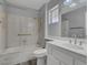 Updated bathroom featuring marble tile and shower at 8500 Gull Dr, Las Vegas, NV 89134