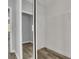 This is a walk-in closet with shelving and wood flooring at 8500 Gull Dr, Las Vegas, NV 89134