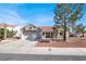 Charming single story home featuring a tile roof and well maintained front yard at 8500 Gull Dr, Las Vegas, NV 89134