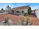 Exterior of home featuring desert landscaping and a red tile roof at 8500 Gull Dr, Las Vegas, NV 89134