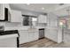 Bright kitchen featuring white countertops, stainless appliances and modern fixtures at 8500 Gull Dr, Las Vegas, NV 89134