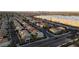 Expansive aerial shot capturing the community's layout, complete with residential streets and convenient access to shopping centers at 8532 Caddy Corner St, Las Vegas, NV 89139