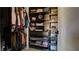 Custom closet with rods and shelving for optimal storage at 8532 Caddy Corner St, Las Vegas, NV 89139