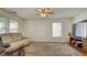 Living room with comfortable seating and a TV at 8532 Caddy Corner St, Las Vegas, NV 89139