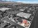 Aerial shot of house with a private pool in a residential neighborhood at 8600 Soneto Ln, Las Vegas, NV 89117