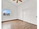 This bedroom features a window and closet with paneled doors at 8600 Soneto Ln, Las Vegas, NV 89117