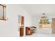 Bright living space with a traditional piano and views of the backyard and pool at 8600 Soneto Ln, Las Vegas, NV 89117