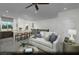 Open concept living room and kitchen showcasing seamless flow and modern design with barstool seating at 890 Apatite Pl # Lot 68, Henderson, NV 89011