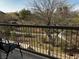 Enjoy serene outdoor views from this home's balcony overlooking paths and trees at 9078 Camp Light Ave # 102, Las Vegas, NV 89149