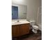 A well-maintained bathroom featuring a vanity with storage and a shower-tub combination at 9078 Camp Light Ave # 102, Las Vegas, NV 89149
