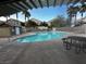 A community pool offers a refreshing escape on warm days at 9078 Camp Light Ave # 102, Las Vegas, NV 89149