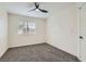 Bright bedroom featuring a ceiling fan and a window with white shutters at 916 Pro Players Dr, Las Vegas, NV 89134