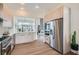 Modern kitchen featuring stainless steel appliances, light wood cabinets, and an open design at 916 Pro Players Dr, Las Vegas, NV 89134