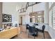Bright living space with an open floor plan, modern lighting, and stylish decor at 916 Pro Players Dr, Las Vegas, NV 89134