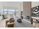 Bright and spacious living room with modern fireplace, decor, and ample natural light at 916 Pro Players Dr, Las Vegas, NV 89134