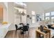 Open living area featuring contemporary lighting, shutters, and views to the yard at 916 Pro Players Dr, Las Vegas, NV 89134