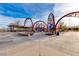 Modern playground equipment in a well-maintained community park with scenic views at 9277 Valley Ranch Ave, Las Vegas, NV 89178