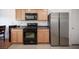 Well-lit kitchen with stainless steel appliances, a gas range, and ample cabinet space for storage at 9277 Valley Ranch Ave, Las Vegas, NV 89178