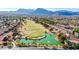 Scenic aerial view of the golf course homes with desert landscaping and mountain views at 9305 Quail Ridge Dr, Las Vegas, NV 89134