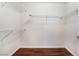 A walk in closet featuring metal shelving and hardwood flooring at 9305 Quail Ridge Dr, Las Vegas, NV 89134