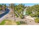 Beautiful Sun City Summerlin community entrance with lush landscaping and desert trees at 9305 Quail Ridge Dr, Las Vegas, NV 89134