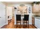 Kitchen area featuring a breakfast bar with views to the living area at 9305 Quail Ridge Dr, Las Vegas, NV 89134