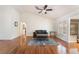 Open living room with hardwood floors, neutral walls, and ample natural light at 9305 Quail Ridge Dr, Las Vegas, NV 89134